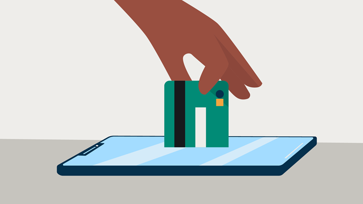 hand with credit card making payment graphic